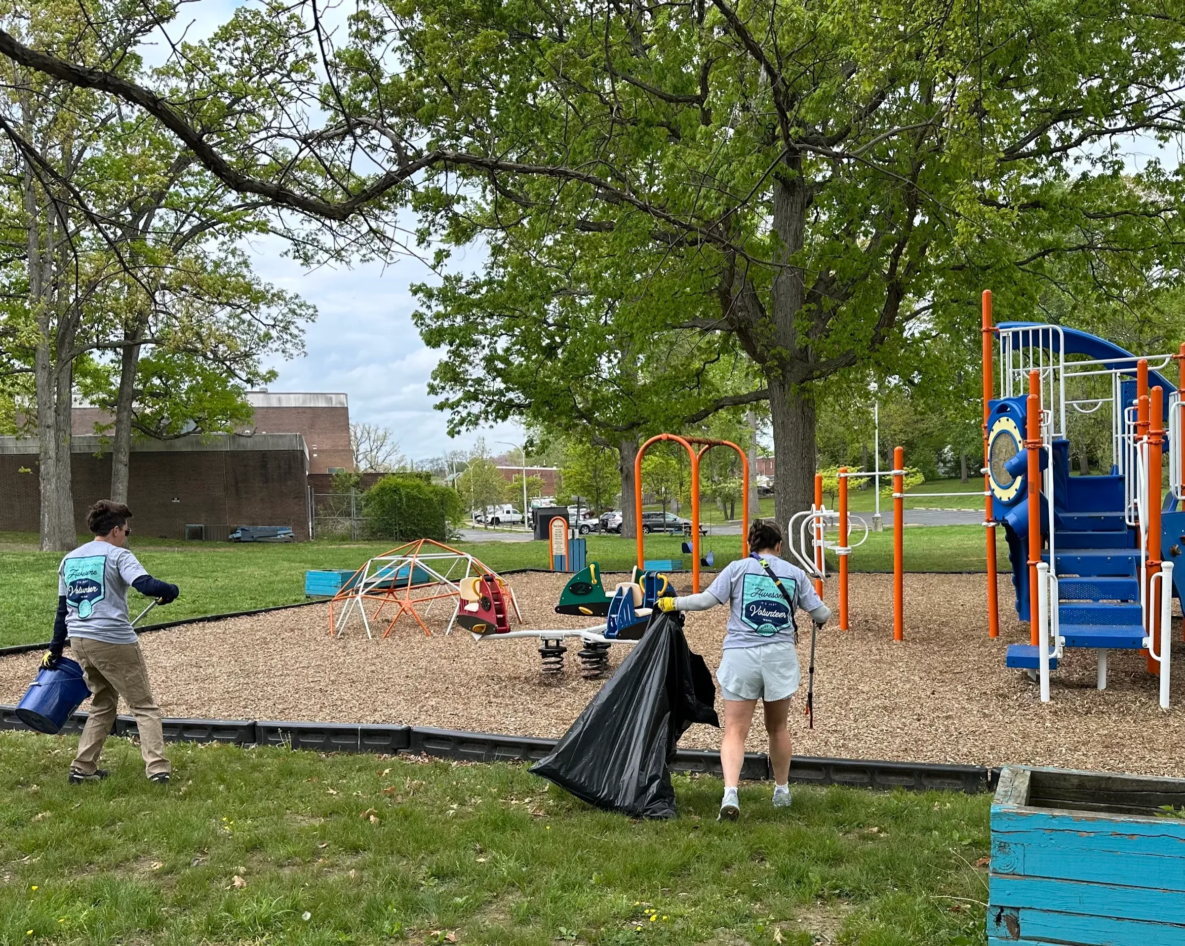 Neighbors working together during the cleanup.